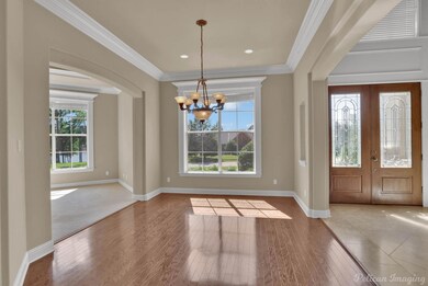 Formal dining room or sitting area next to front d
