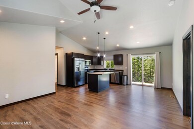 Living Room to Dining and Kitchen Area