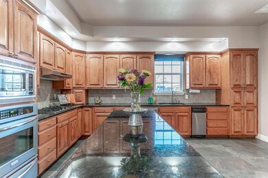 Enormous island for huge buffet set up.  Kitchen a
