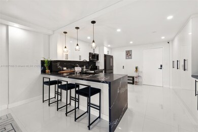 Stuart House unit 7H, Bay Harbor Islands, FL 33154 - photo 2