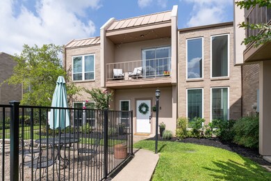 This spacious 2,082-square-foot corner townhome wi