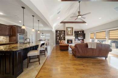 View of open kitchen with family room that feature