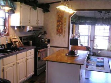 Kitchen with Slab Granite Island