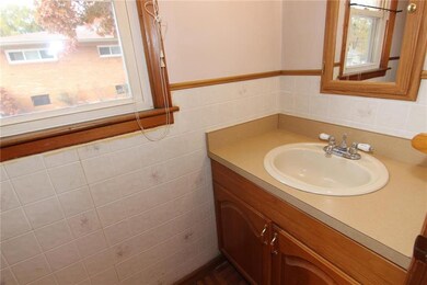 1/2 bath off kitchen.