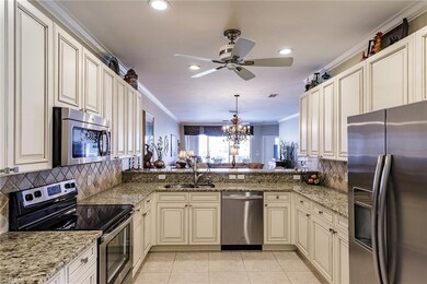 Kitchen With Stainless Appliances and Granite Coun