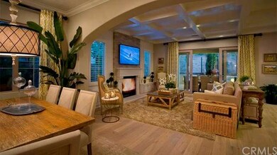 Roomy great room with high ceilings and hardwood floors- as shown in model