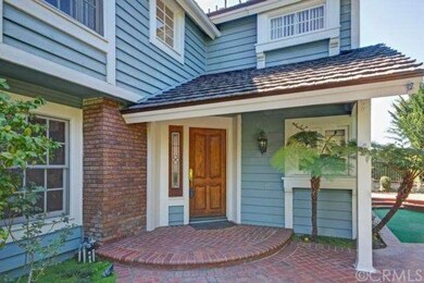 Front entry tucked under the over-hang. This home 