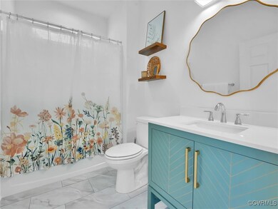 Full bathroom with toilet, shower / tub combo, and