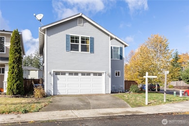 Front view of the house. Two car garage.