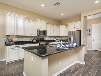 007_Staggered White Cabinets
