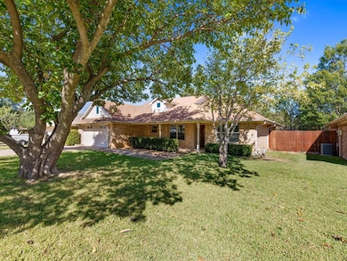 Welcome home to 709 Oak Lane in Grapevine, TX