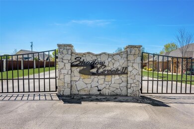 Gated neighborhood entrance.