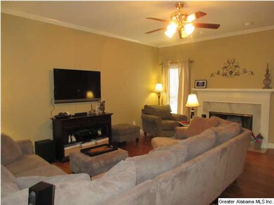 Great Room with Crown Moulding, Hardwoods,