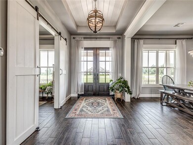 As soon as you enter through the double wood doors