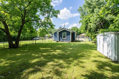 View of yard featuring a storage shed