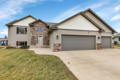 This property features a heated, insulated 3-car garage and a concrete driveway.