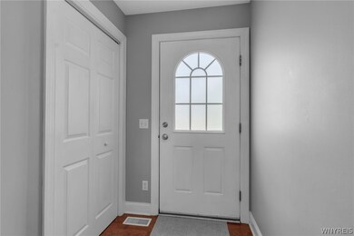 Front door & large coat closet