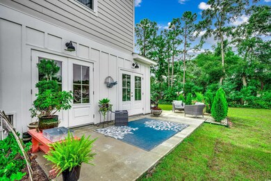 View of patio with french doors and an outdoor han