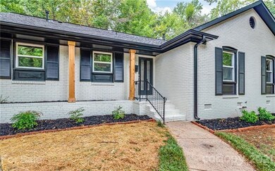 Tastefully restored, landscaped, and painted