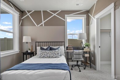 Carpeted bedroom with baseboards