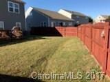 Rear yard - Fenced backyard with deck