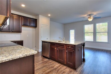 Kitchen featuring stainless steel dishwasher, a ki