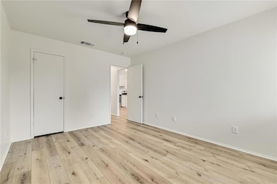 Unfurnished bedroom featuring light wood finished