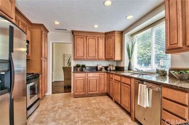 Granite surfaces, sleek Stainless Steel appliances