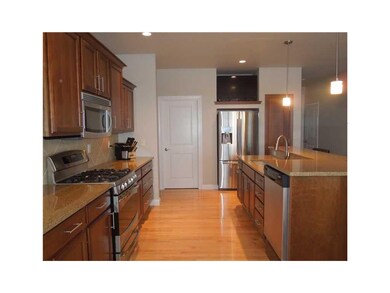 Kitchen. High end appliances, gas top stove, raise