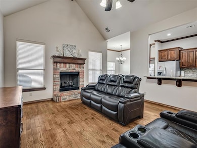 Living room with light wood-type flooring, ornamen