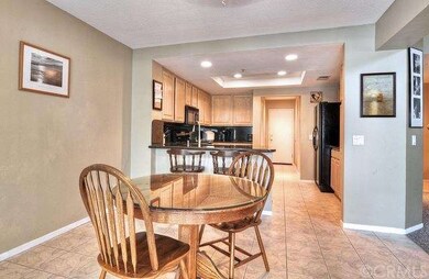 FULL VIEW OF THE KITCHEN AND BREAKFAST NOOK. THE E