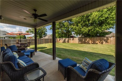 This home has a great covered back porch and back