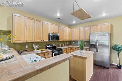 Kitchen has ample cabinet and counter space