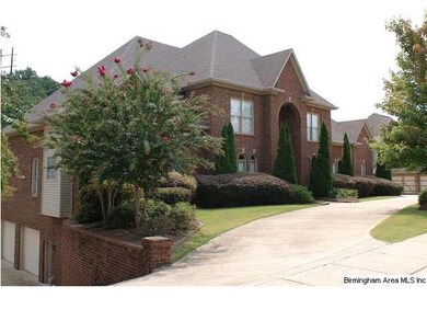 There's a lower level two-car garage and circular 