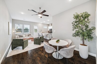 Open-concept layout with modern finishes and hardwood flooring that flows seamlessly throughout the main floor.