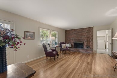 Den with Fireplace and Hearth