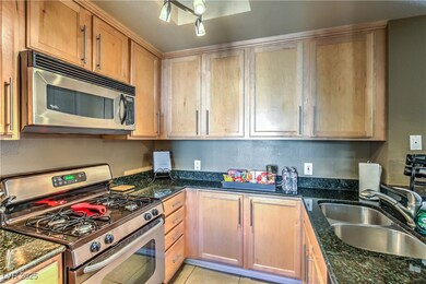 Kitchen featuring stainless steel appliances and d