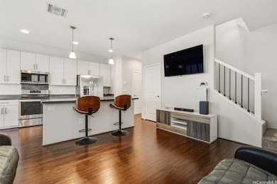 Open Concept Living, Dining, and Kitchen Area