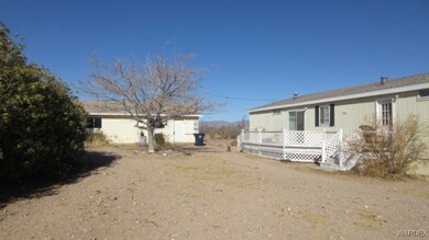 View of side of property with a deck