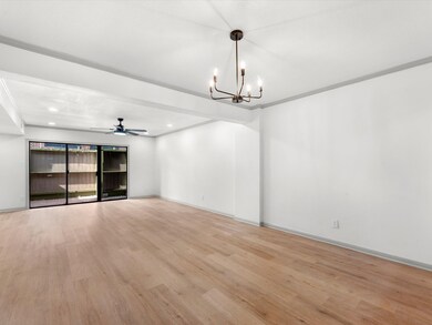 Living/Dining combo and view of back patio