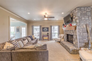 Living room with stone fireplace