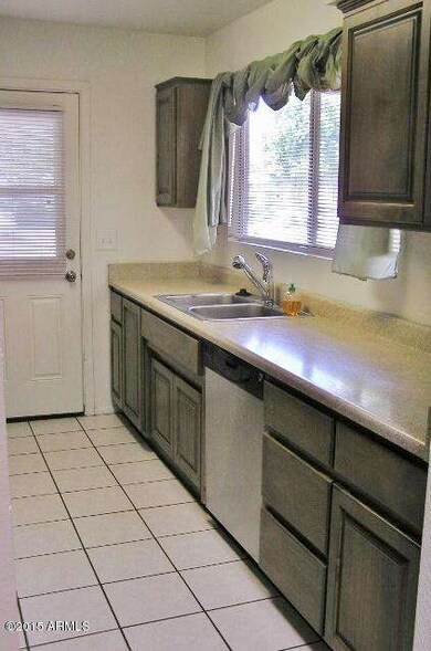 KITCHEN EXITS TO CAR PORT