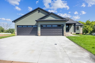 4-stall garage and concrete driveway!