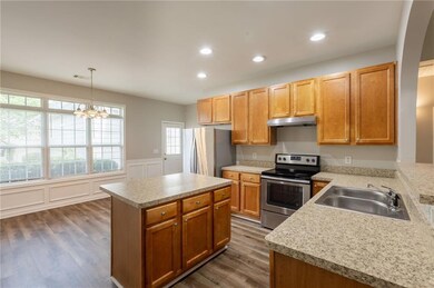 Kitchen featuring appliances with stainless steel 