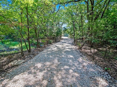 Gated front and back tree-lined entry.