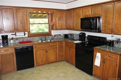 Large kitchen area with enough room to add an isla