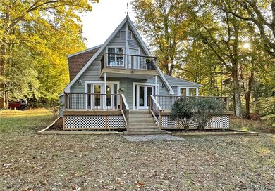 Frontview with Balcony and Wrap Around Deck