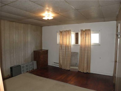 Bedroom. Nice Wood Floors in back third Bedroom in