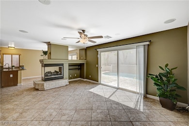 Unfurnished living room featuring a fireplace, cei