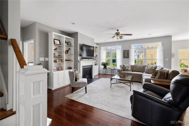 Living room featuring dark hardwood / wood-style f